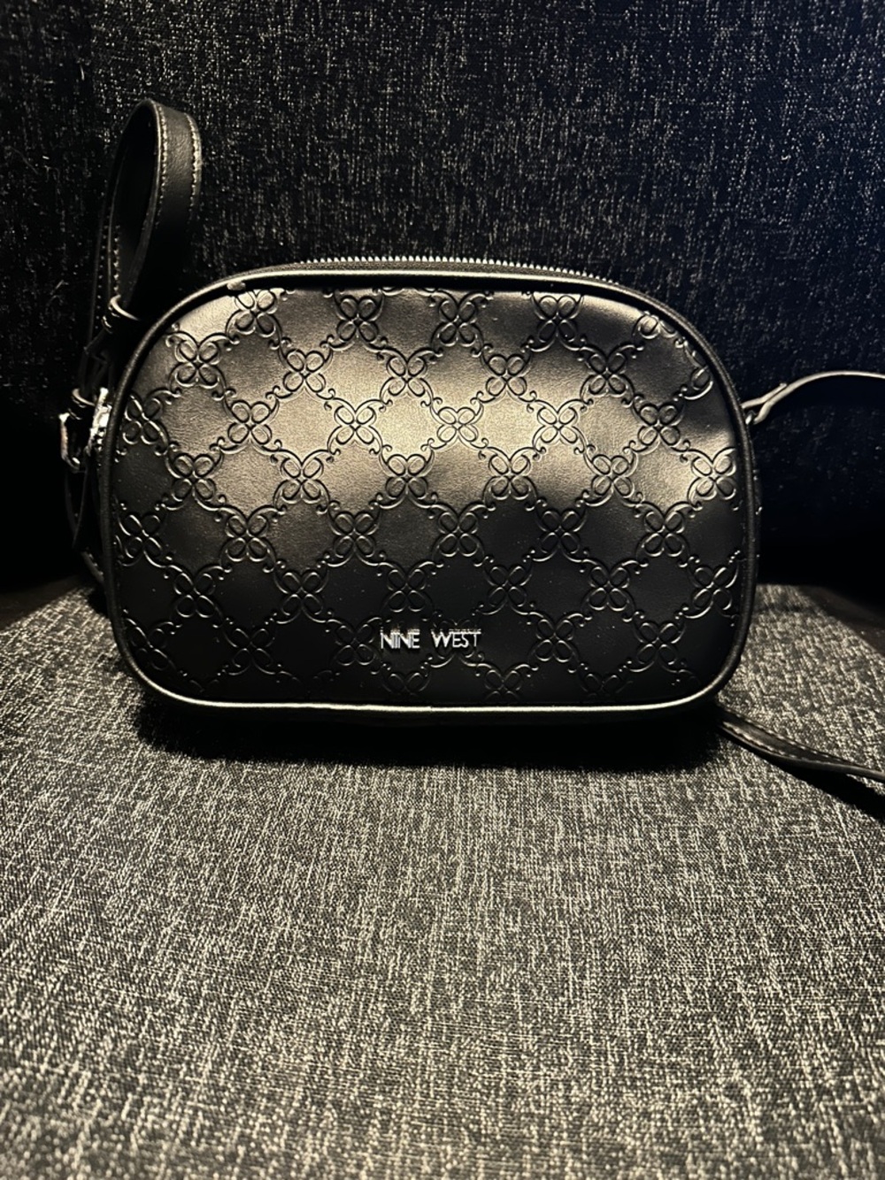Nine West Kylene Mini Camera Crossbody in jet black.